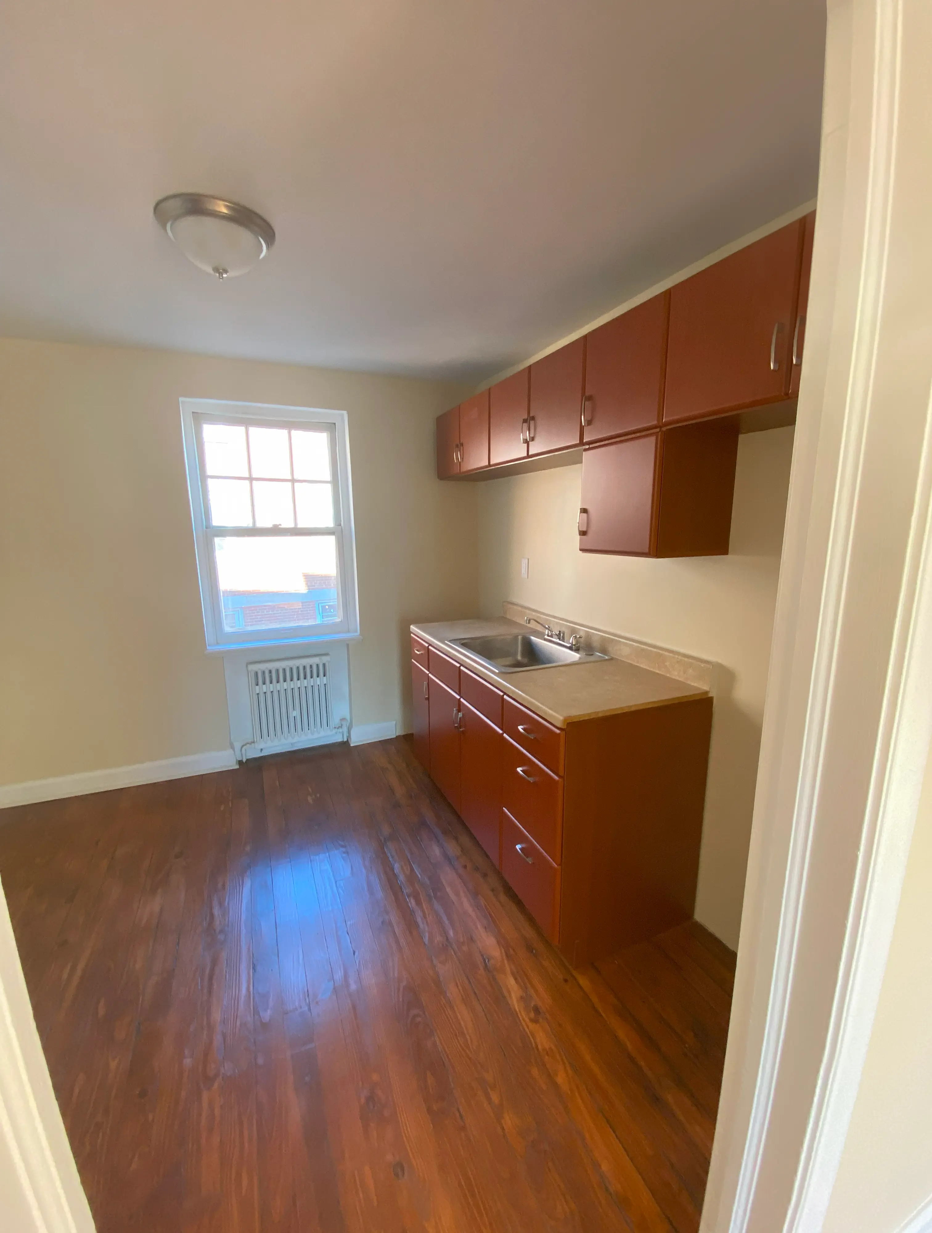 Sunny Southview kitchen with hardwood flooring